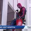 Superheroes surprise children at Palm Beach hospital