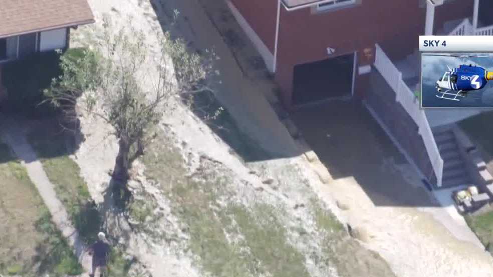 Major water main break floods yards in Scott Township