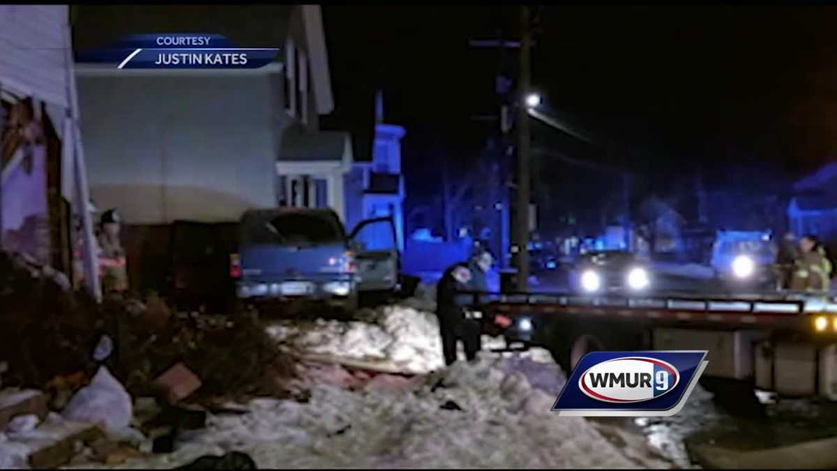 Car crashes through house and into neighbor's house