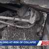 Platte County store owner discovers storm drain erosion under historic building porch