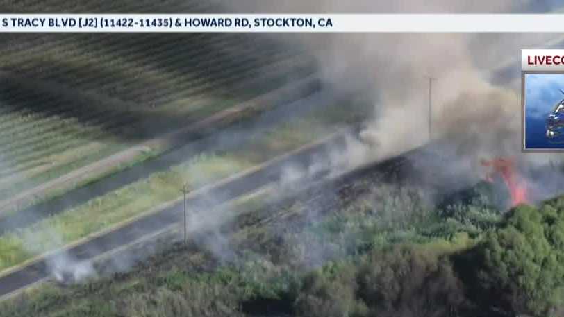 Vegetation fire shuts down roadway in San Joaquin County