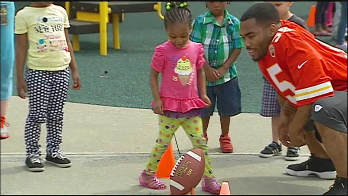 Chiefs players run with kids at Operation Breakthrough