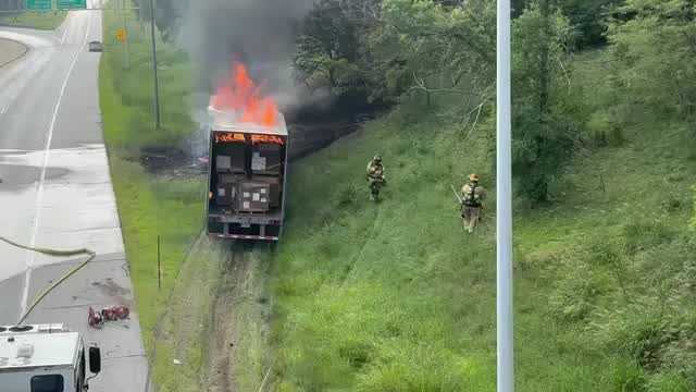 Omaha fire crews battle vehicle fire that injured one person