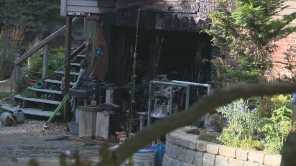 Neighbors rescue woman from burning home