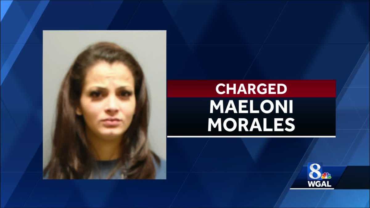 Woman accused of stabbing man holding baby charged with attempted homicide