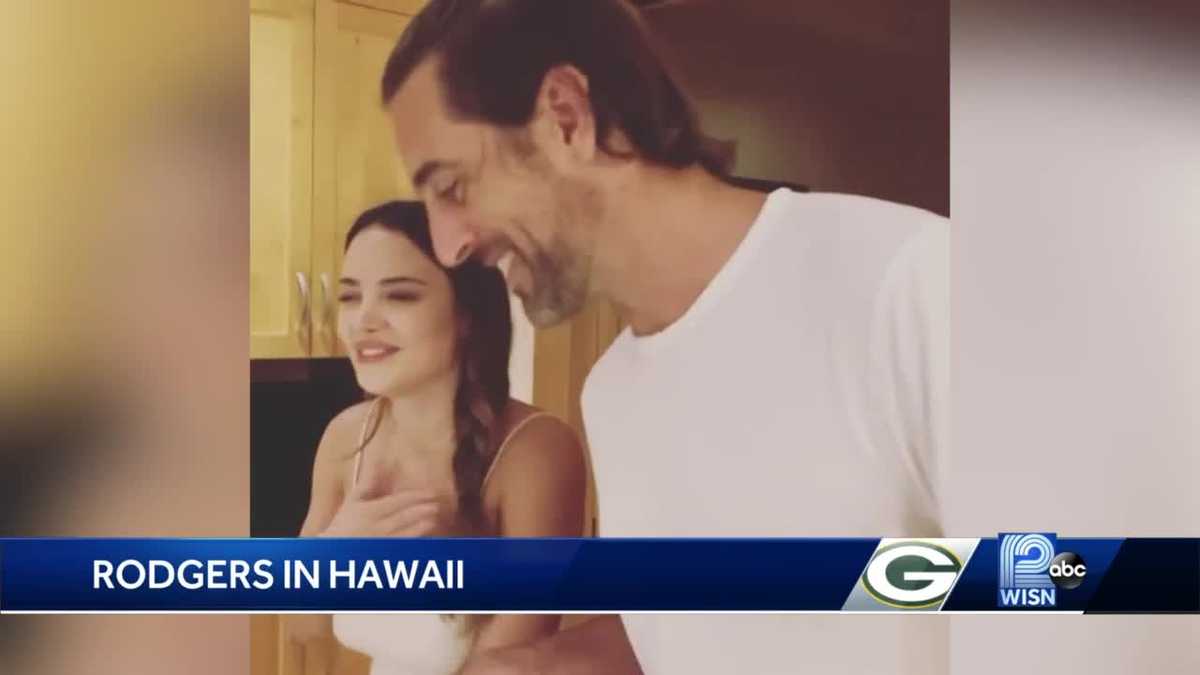 photo Aaron Rodgers Hawaii Man Bun aaron rodgers golf the match tom brady