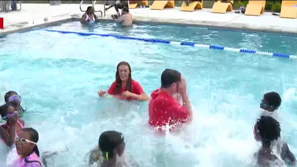 Tori and intern Ryan jump in! Baltimore opens Poppleton pool