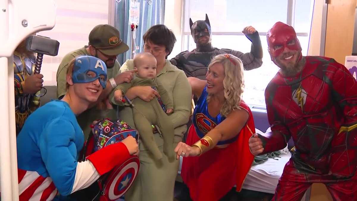 Larry's Window Service employees don superhero outfits, visit Blank ...