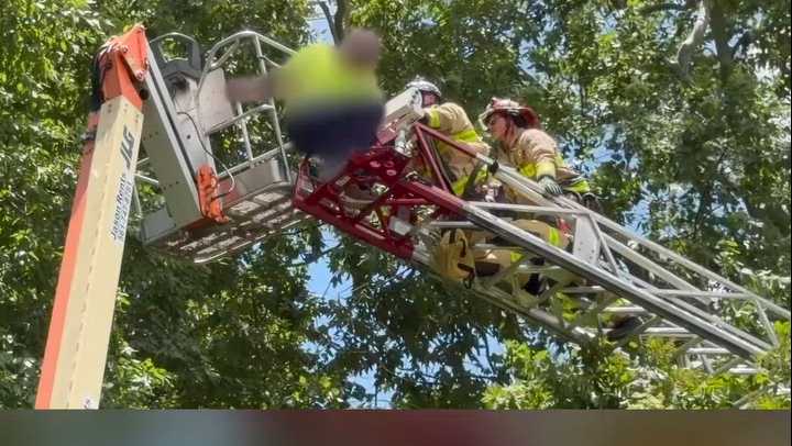 Firefighters rescue man stuck 40 feet in air in Stuart