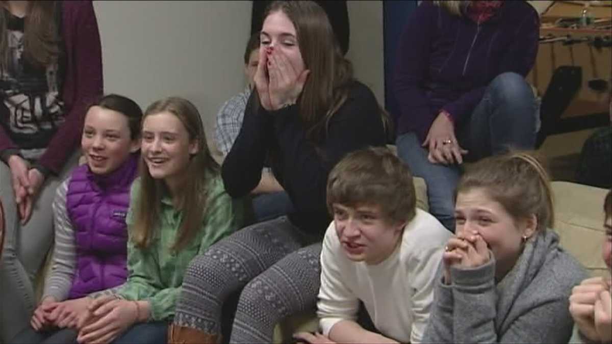 Family and friends watch as Sophie Caldwell makes history