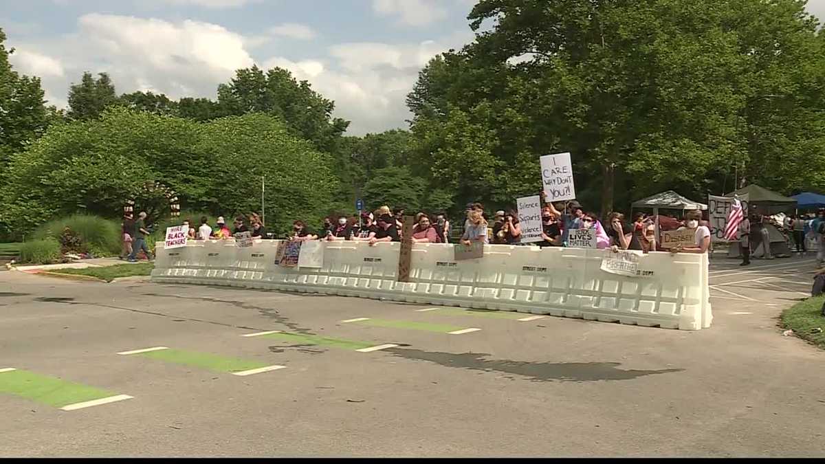 Protesters close part of Massachusetts Street in Lawrence