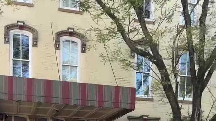 Anti-redistricting protesters station outside Indiana governor's luncheon in New Albany