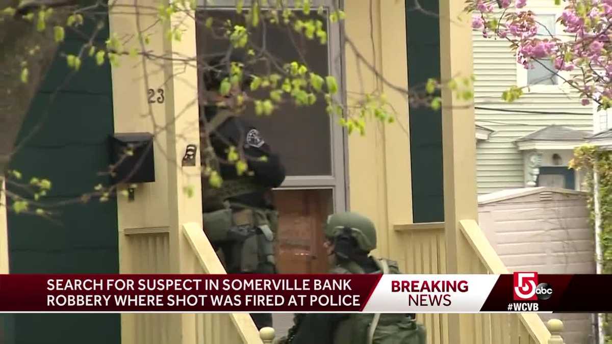 Search on for suspect who robbed bank, shot at police