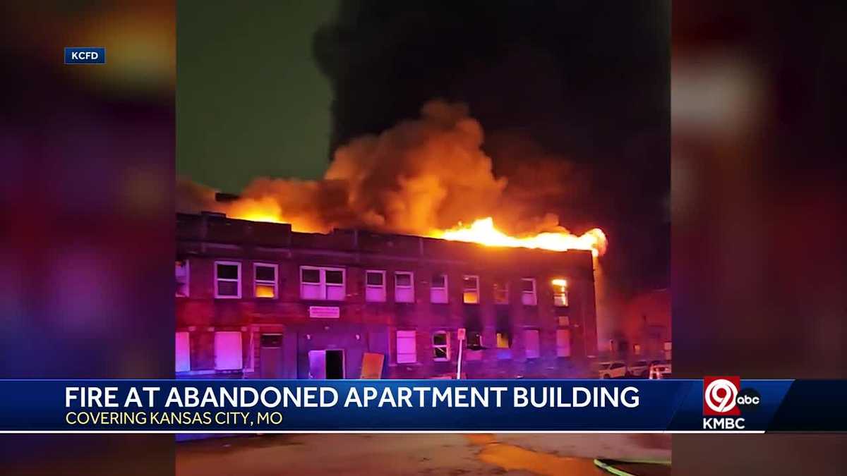 Firefighters battle blaze at abandoned apartment building