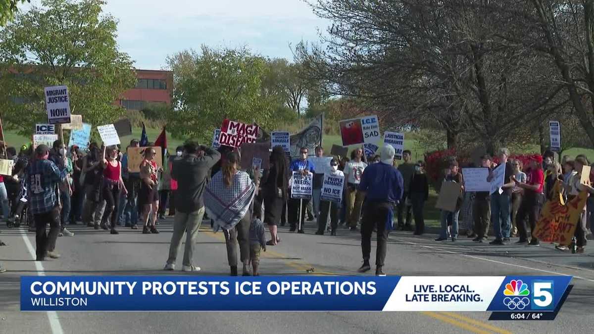 Protestors gather on Harvest Lane to rally against ICE expansion in Vermont