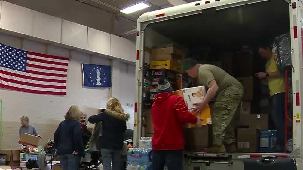Volunteers in Taunton packing hundreds of boxes of supplies for Ukraine