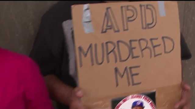 Protesters rally to end wave of police shootings 