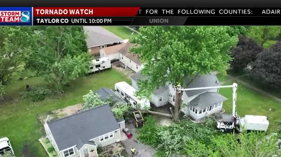 Rockwell City residents clean up after winds topple trees, damage garage