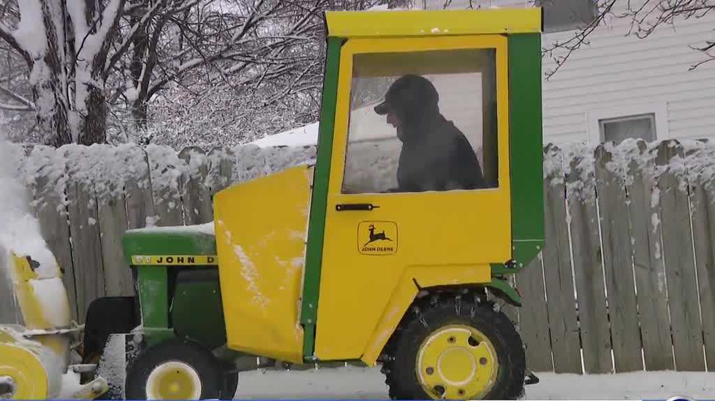 Elkhorn residents work to clear snow from homes