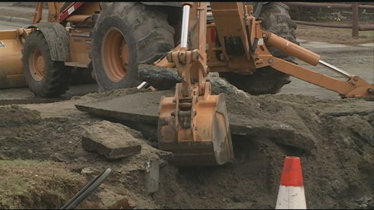 Crews work to repair water main break
