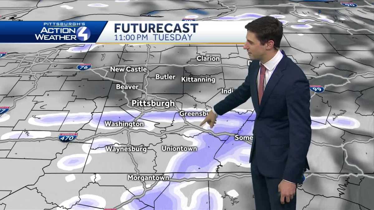 Snow showers ending tonight, mostly cloudy on New Year's Day