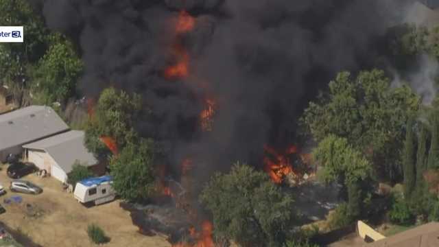 Sacramento fire destroys home, trailer, and belongings, leaving residents stunned