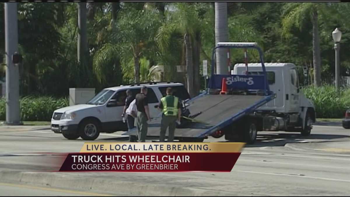 Woman in motorized wheelchair hit by truck