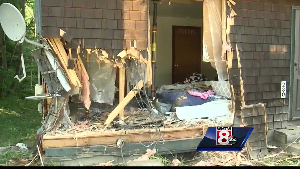 Car crashes into bedroom, lands on bed