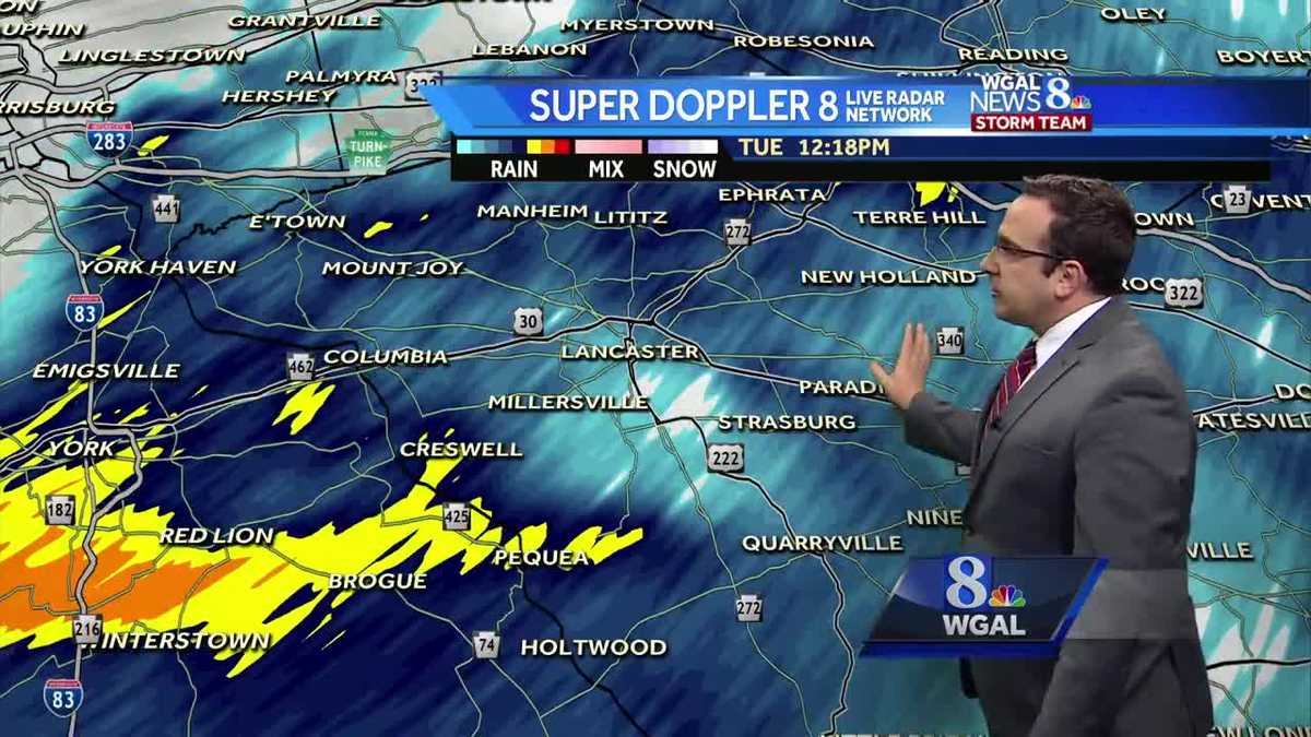 Rain tapers to scattered showers