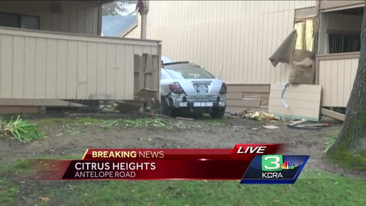 Driver crashes car into apartment building