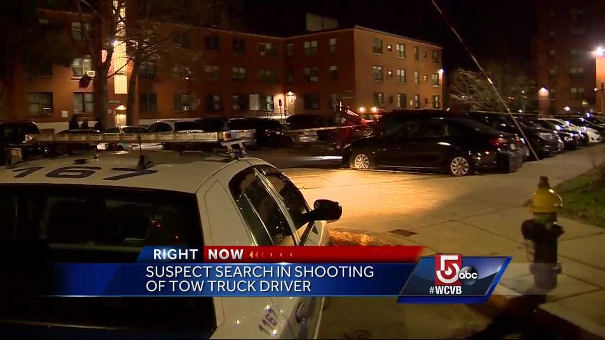 Police search for suspects in shooting of tow truck driver