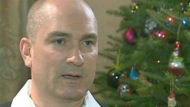 Hero police officer jumps into freezing water to rescue woman