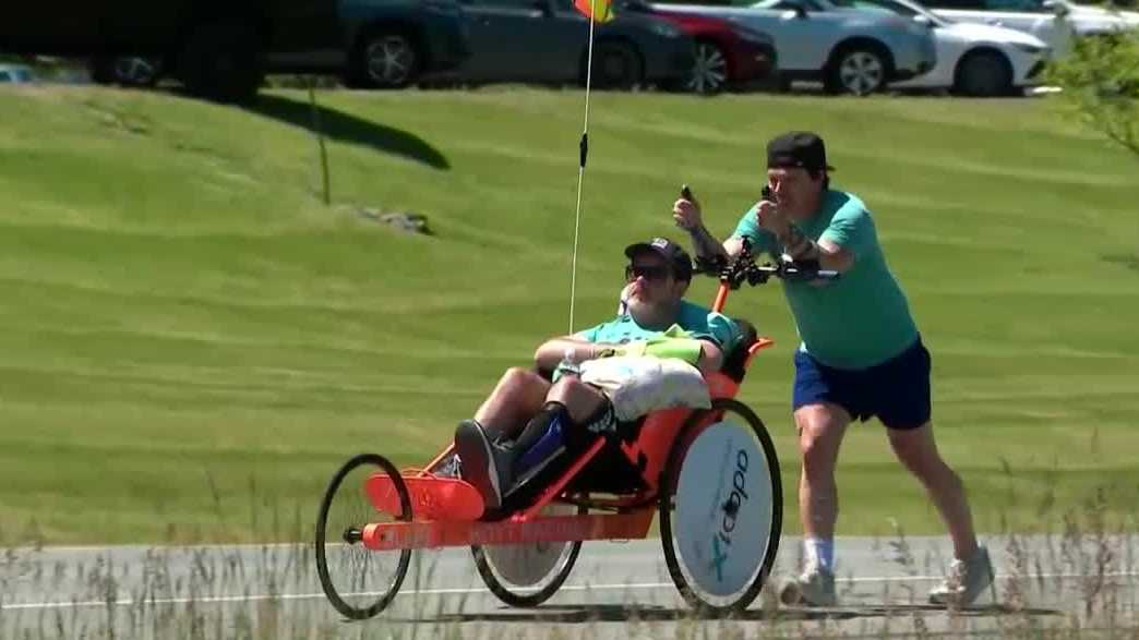 Recycled Percussion founder completes 160-mile journey with wheelchair-bound friend