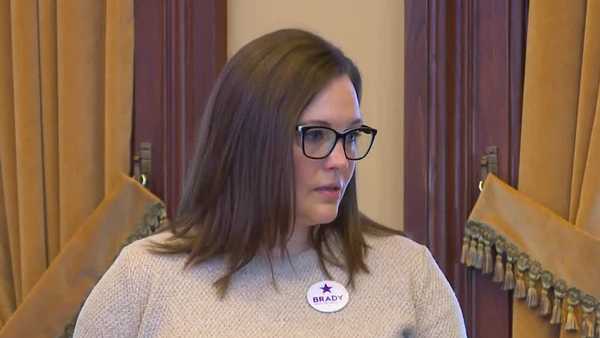 group gathers at iowa statehouse to protest bill that would arm school staff