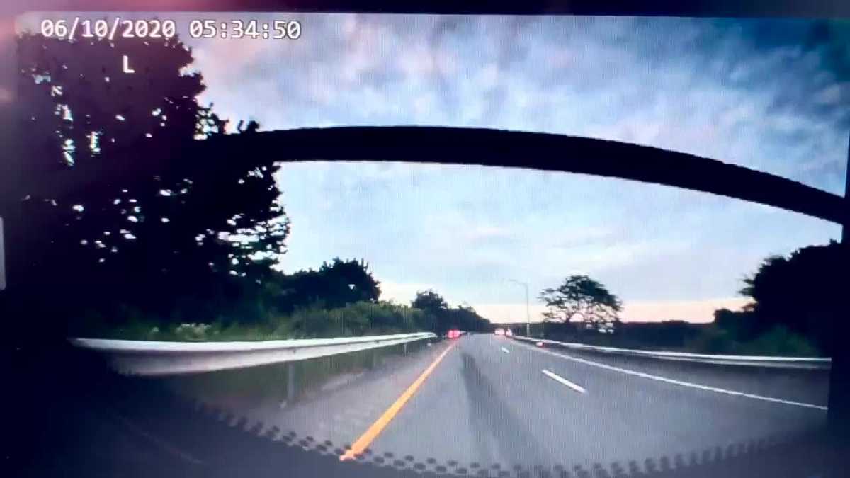 VIDEO Unsecured load nearly strikes trooper and tractortrailer operator
