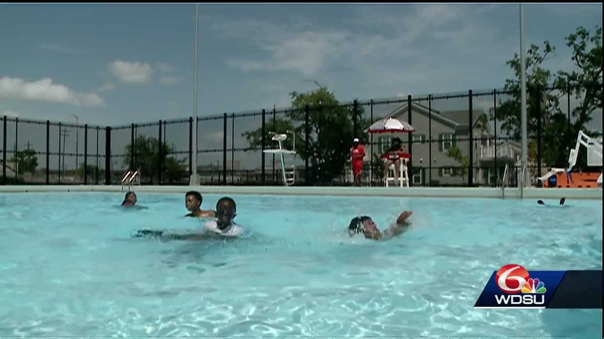 NOLA mayor jumps into pool to mark start of pool season