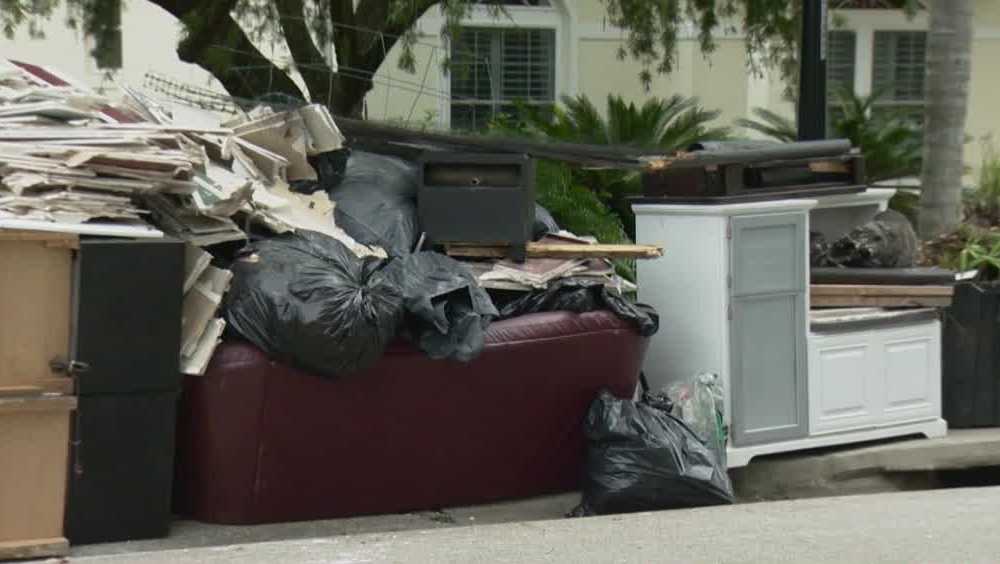 Flooded Oviedo neighborhood starts long clean-up process