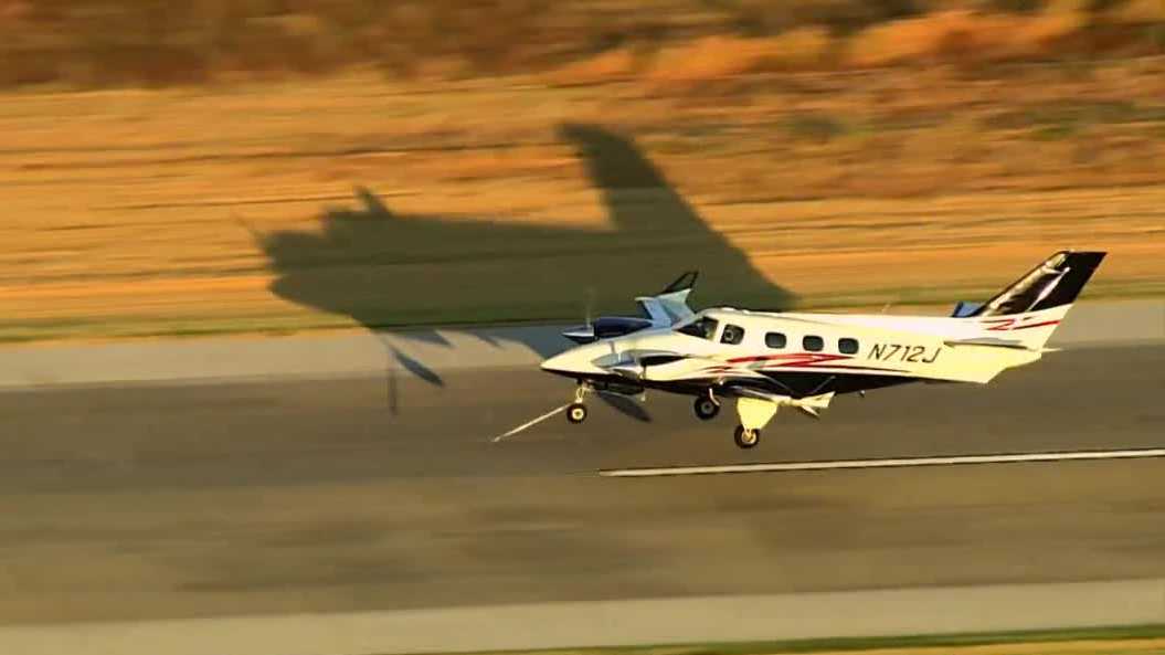 WATCH: Video shows small plane with tow bar still attached to wheel forced to land