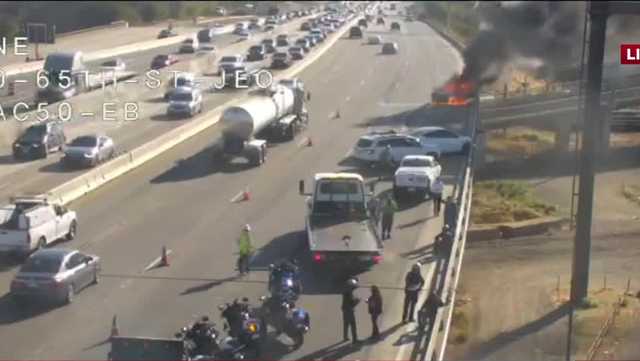 Traffic delays after crash, vehicle on fire on Highway 50 in Sacramento