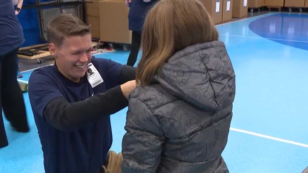 Des Moines students receive winter gear from Athene donation