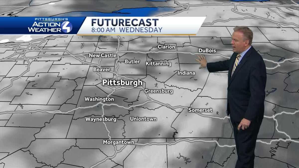 Mostly cloudy with light snow tonight