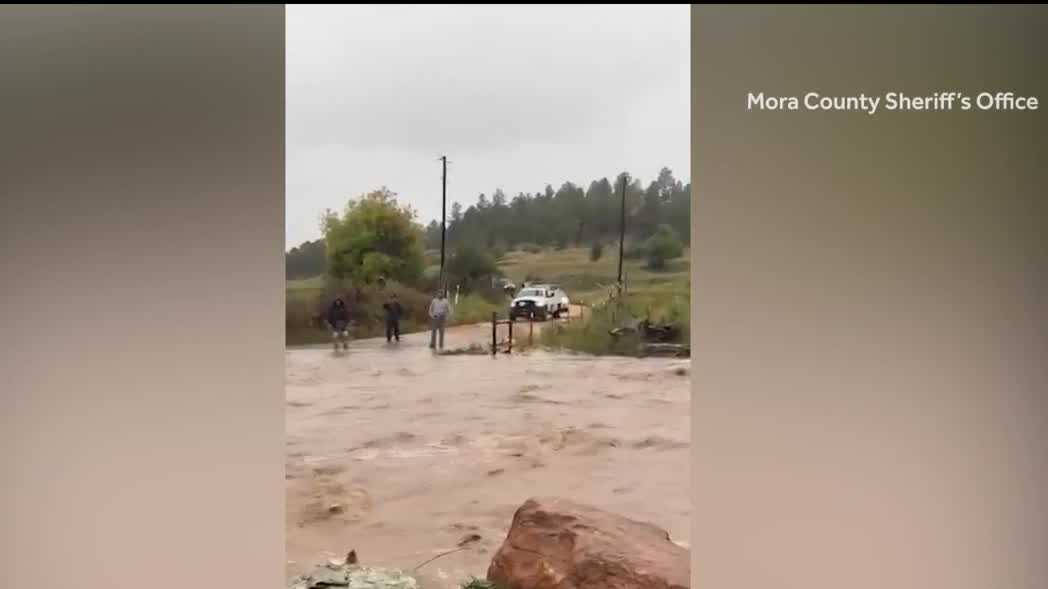 Mora County crews rescue two people after floodwaters block roads