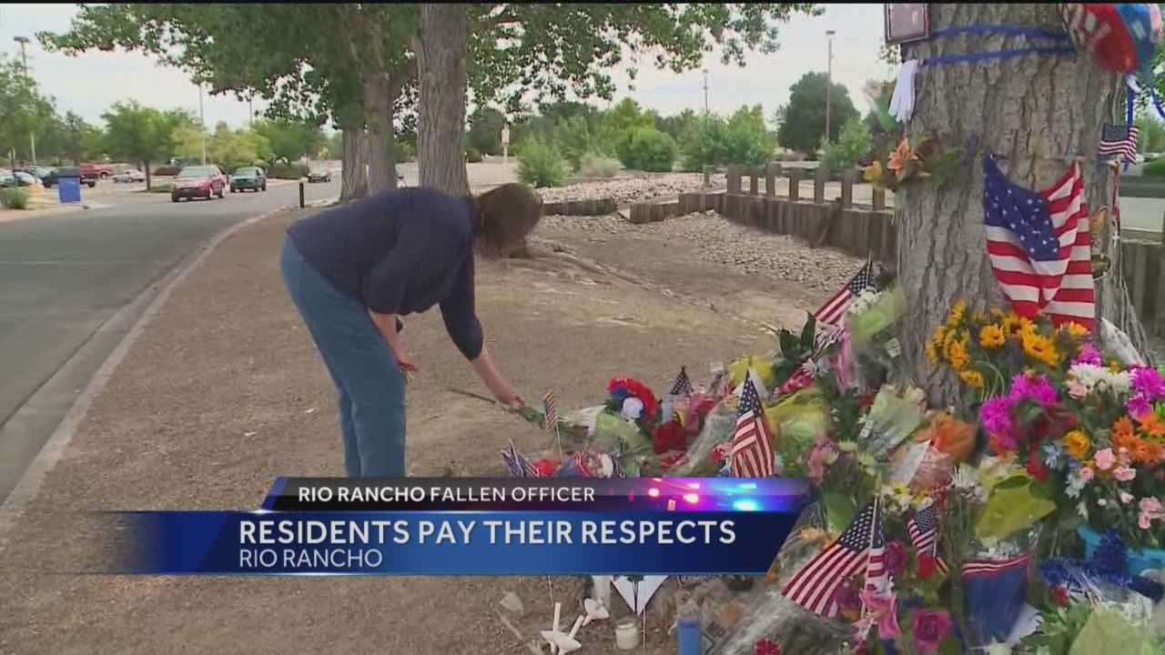 Residents Pay Respects To Fallen Officer