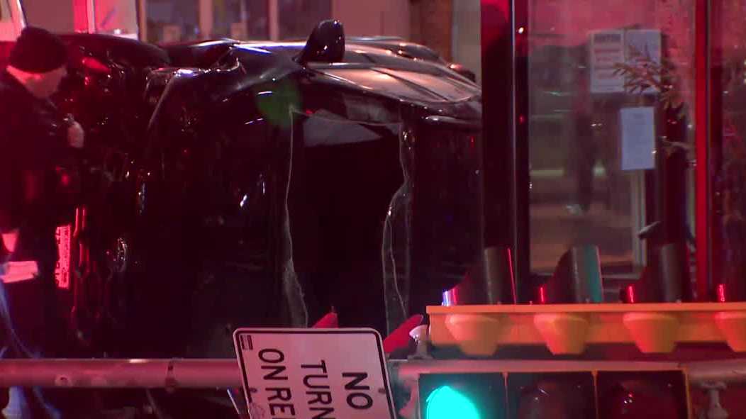 Car slams into pole, flips on its side on Milwaukee’s Upper East Side