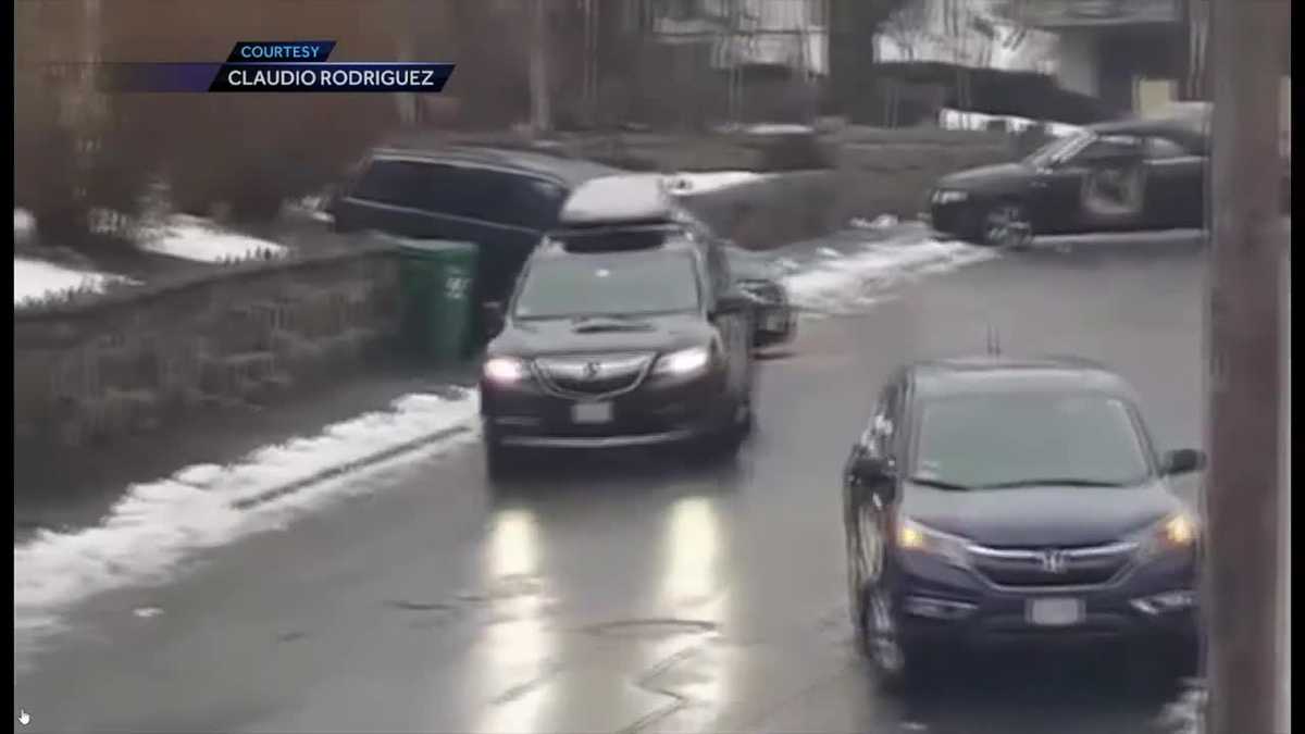 Video shows vehicle sliding down icy roads
