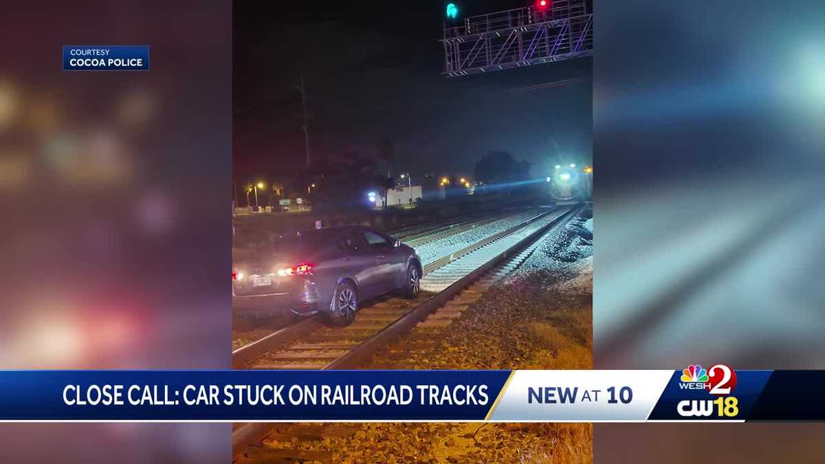 Cocoa officers stop train to save driver stuck on tracks