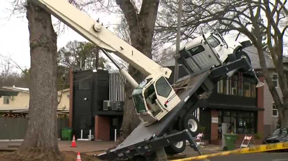 Video: Big rig in the air after tree crane falls on it in midtown Sacramento