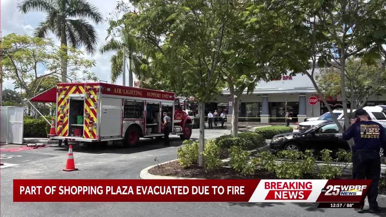 Fire rekindles at Greenacres plaza on S. Jog Road, triggers evacuation and roof attack