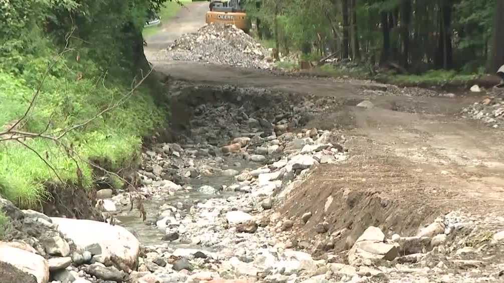 Roads washed out in NH communities hit hard by earlier storms