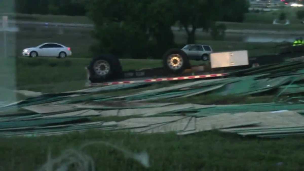 Semi-truck rolls over on I-40 EB ramp to I-235 in OKC - KOCO